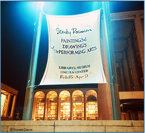 Lincoln Center Plaza with the banner announcing the exhibition "Stanley Roseman - The Performing Arts in America" at the Library and Museum for the Performing Arts, Lincoln Center, New York City, 1977. � Ronald Davis