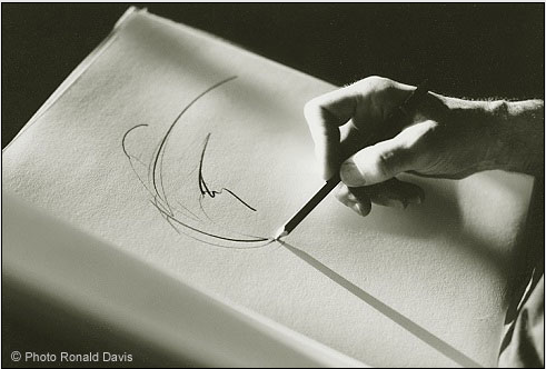 Photo of the hand of the artist Stanley Roseman at work, Paris Opra, 1994.  Ronald Davis